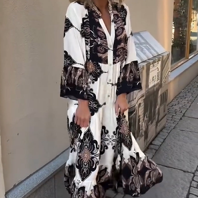 Elegant og alsidig kjole med kunstnerisk print