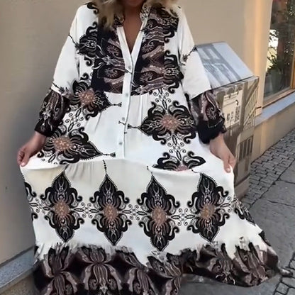 Elegant og alsidig kjole med kunstnerisk print