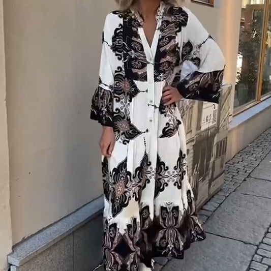 Elegant og alsidig kjole med kunstnerisk print