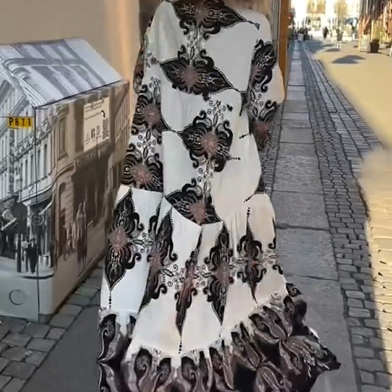 Elegant og alsidig kjole med kunstnerisk print